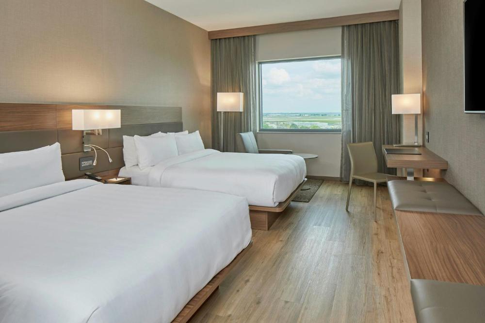 Guest room, 2 Queen, Airport view interior
